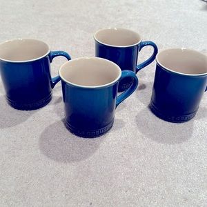 Le Creuset set of 4 mugs. $70 new.